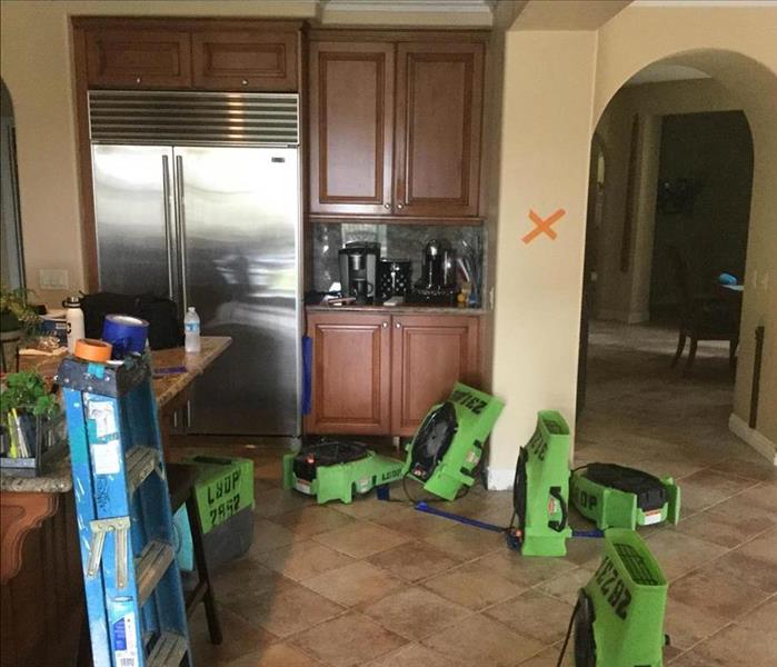 Drying equipment in kitchen.