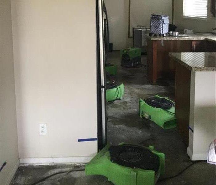 Drying equipment in kitchen.