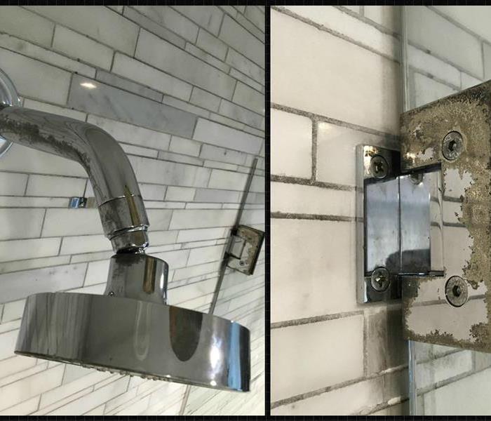Shower head with damage.