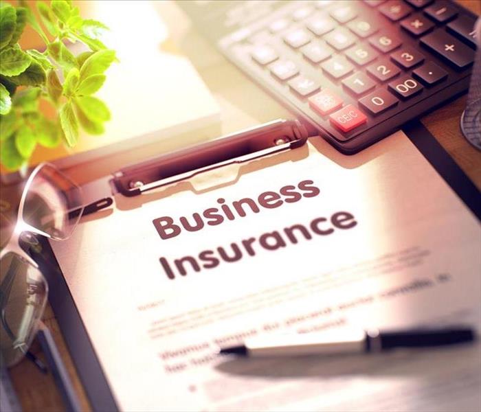 A business insurance form on the table