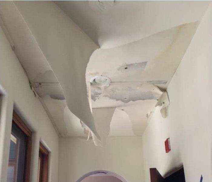Damaged ceiling due to broken pipe